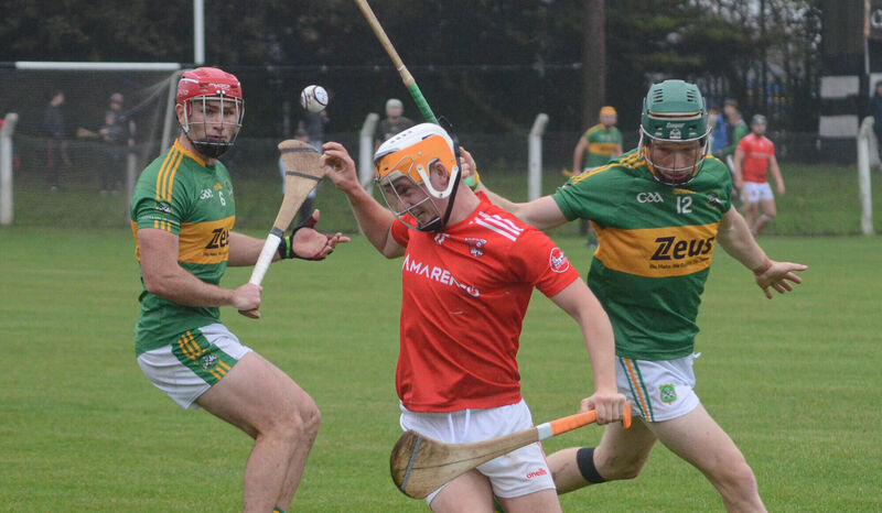 Castlemartyr's Eoghan Martin attempts to grab the sliotar ahead of Colm Spillane and Colm McCarthy of Castlelyons during the Co Op Superstores Premier Intermediate Hurling Championship semi final match in Midleton. Picture: Howard Crowdy