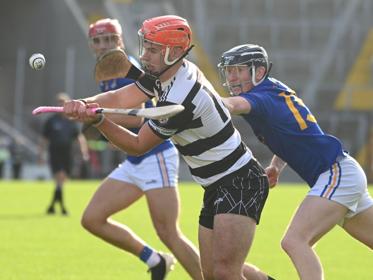 Midleton's Ciarmhac Smyth is tackled by St. Finbarr's Jack Cahalane during the Co-Op Superstores Cork Premier SHC semi final at Pairc Ui Chaoimh. Picture; Eddie O'Hare