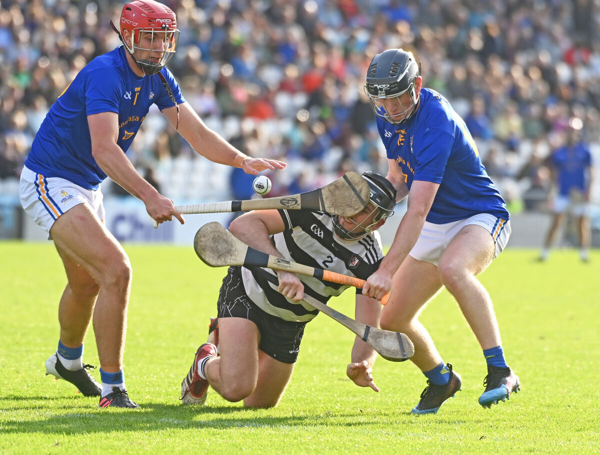 Midleton's Sean O'Sullivan is tackled by St. Finbarr's Brian Hayes and Jack Cahalane during the Co-Op Superstores Cork Premier SHC semi final at Pairc Ui Chaoimh. Picture; Eddie O'Hare