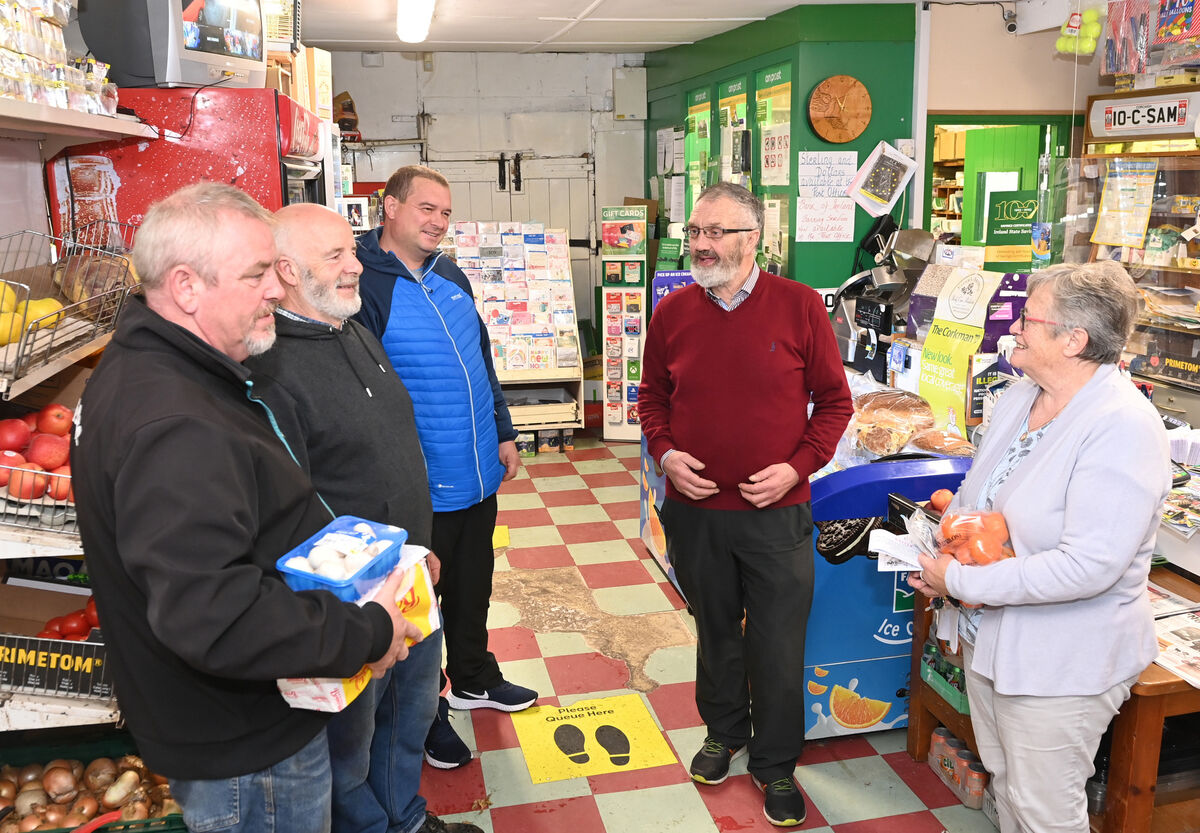  John Crowley, postmaster chatting with customers and locals John O'Sullivan, Con O'Sullivan, Brian Cotter and Sheila Scannell at Rylane post office. Picture; Eddie O'Hare