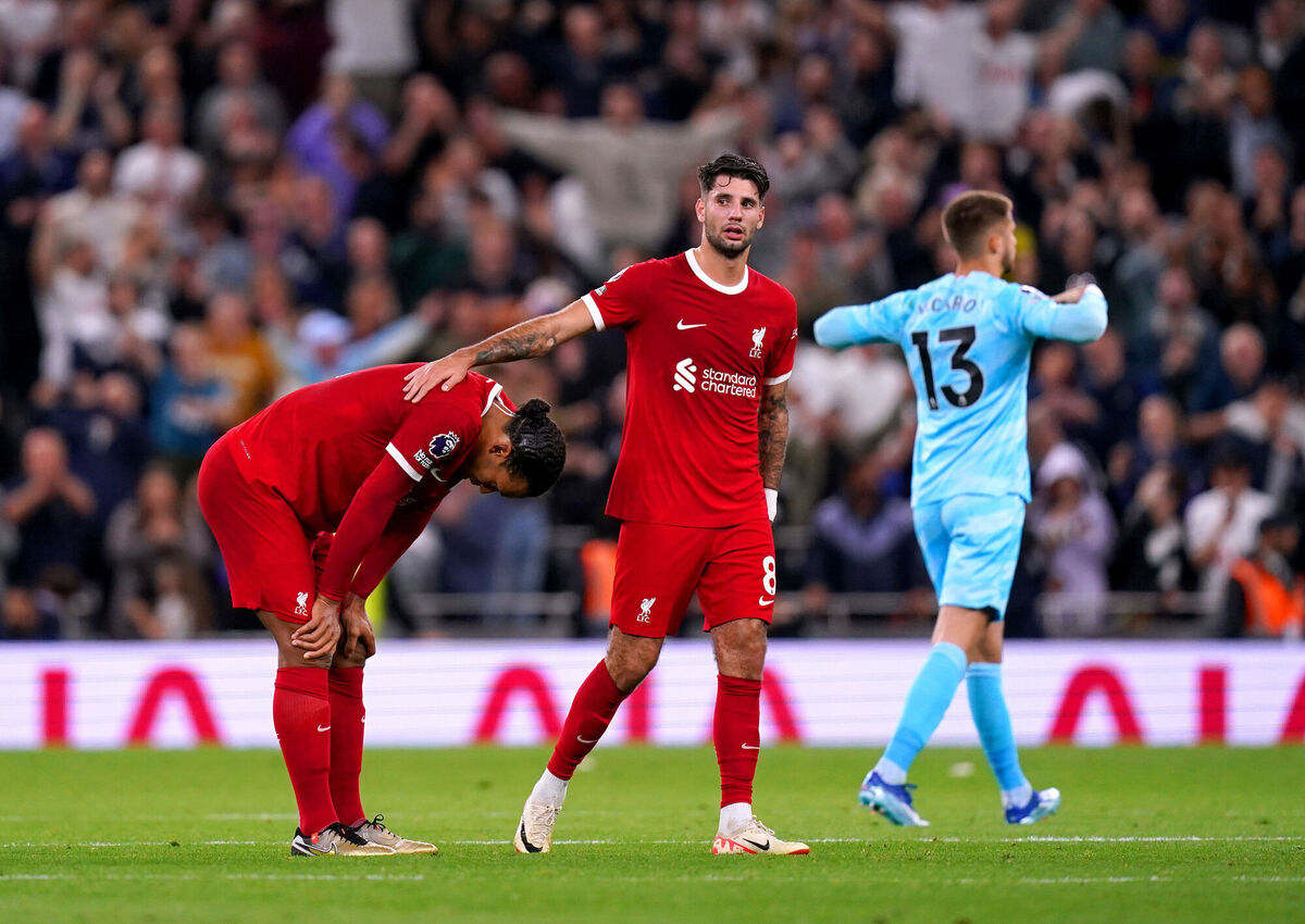 Liverpool's Virgil van Dijk is comforted by team-mate Dominik Szoboszlai at the end of the Premier League match at Tottenham Hotspur Stadium, London. Picture: John Walton/PA Wire Liverpool's Virgil van Dijk is comforted by team-mate Dominik Szoboszlai at the end of the Premier League match at Tottenham Hotspur Stadium, London. Picture: John Walton/PA Wire