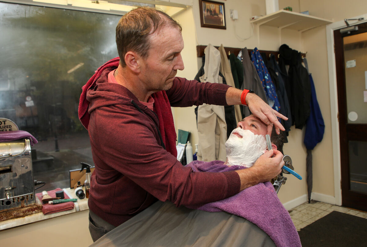 Groom, Patrick Blake getting a hot shave for his wedding day by barber Donncha O'Callaghan at the Mick Moriarty salon on Great William O'Brien Street, Cork. - Picture: David Creedon Groom, Patrick Blake getting a hot shave for his wedding day by barber Donncha O'Callaghan at the Mick Moriarty salon on Great William O'Brien Street, Cork. - Picture: David Creedon