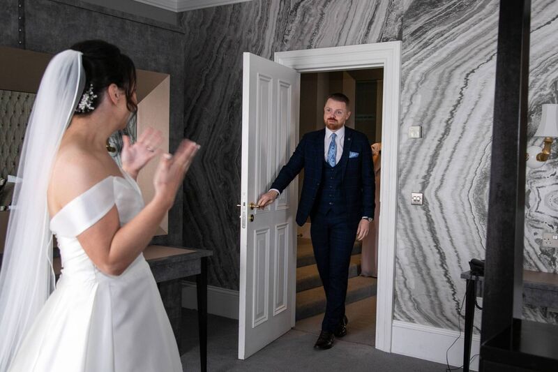 The couple decided to have a first reveal in the bridal suite, rather than wait until the ceremony.