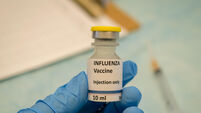 Influenza virus vaccine holding in hand