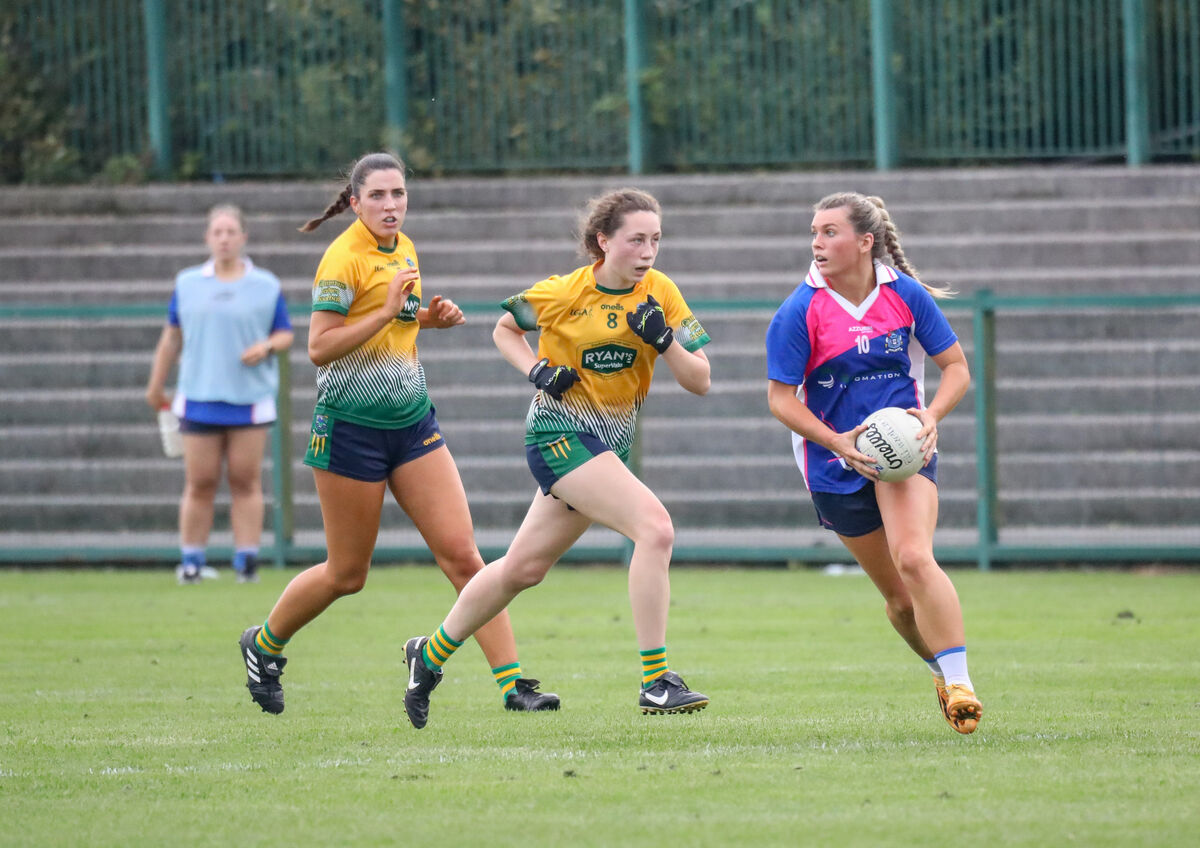 Naomh Abán's Róisín Corkery under pressure from Abbie O'Mahony. Picture: David Creedon