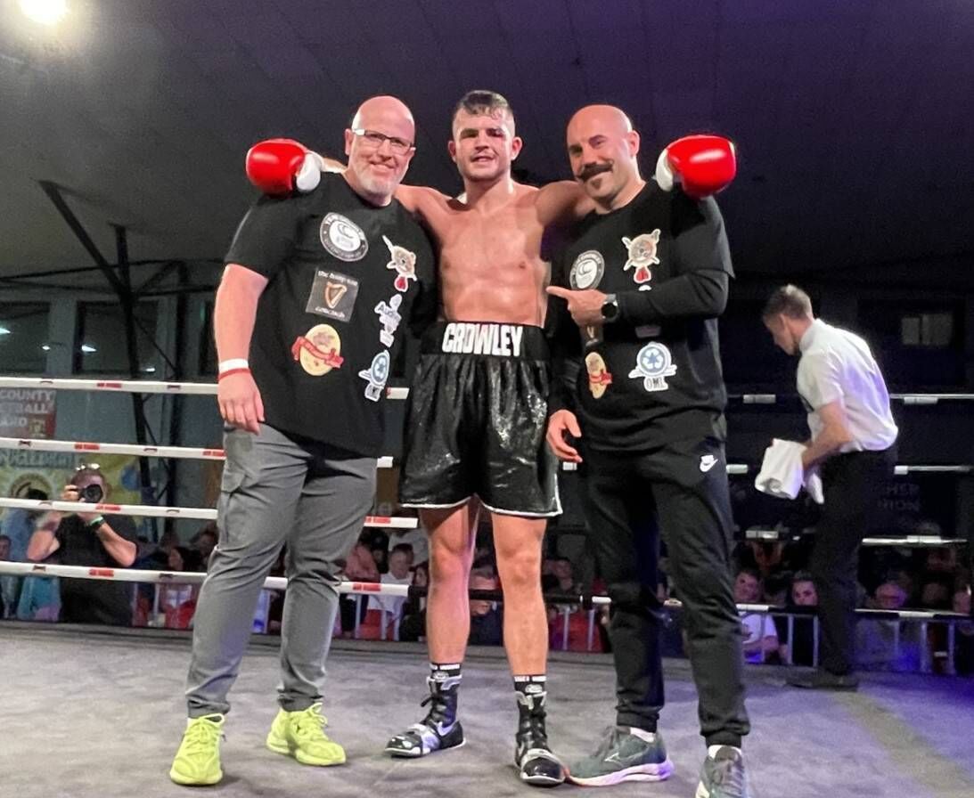 Cork boxer Cathal Crowley with trainers Gary 'Spike' O’Sullivan and Dave O’Connell after his superb knockout victory at the Gurranabraher Credit Union Arena. Cork boxer Cathal Crowley with trainers Gary 'Spike' O’Sullivan and Dave O’Connell after his superb knockout victory at the Gurranabraher Credit Union Arena.