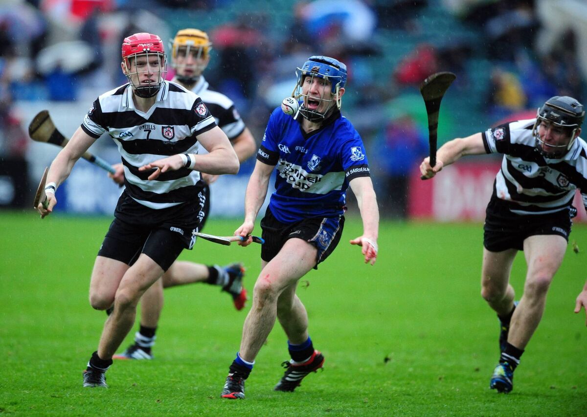 Sarsfields Daniel Roche tries to evade Midleton pair James Nagle and Séamus O'Farrell. Picture: Eddie O'Hare