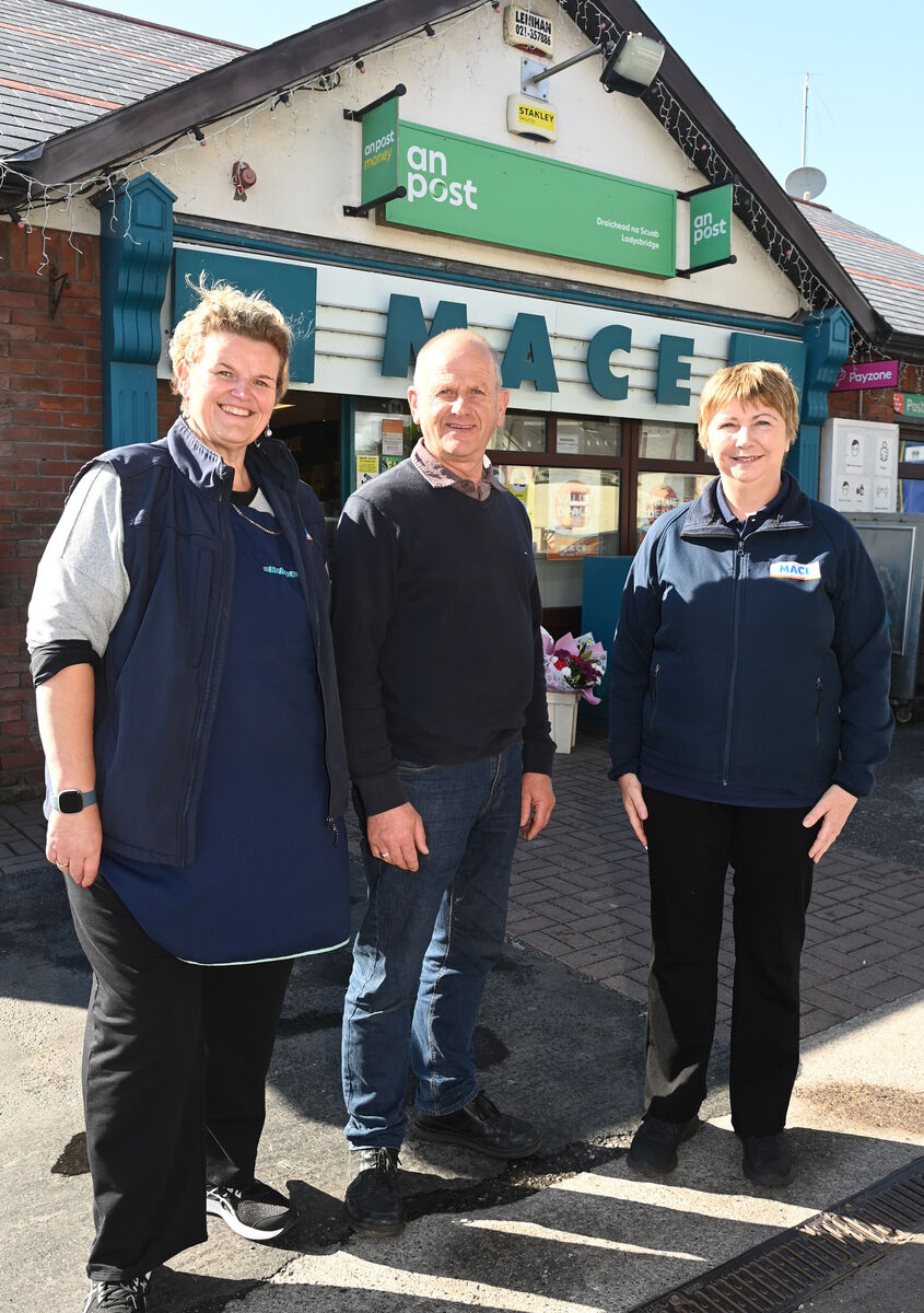 Denis O'Flynn, postmaster with assistants Nina Beausang and Geraldine Crowley at Ladysbridge post office in East Cork. Picture; Eddie O'Hare