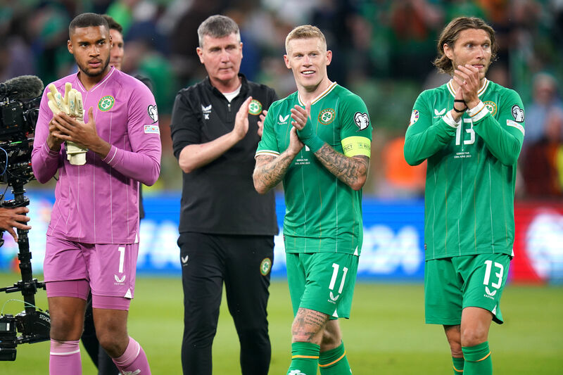 Republic of Ireland goalkeeper Gavin Bazunu (left), manager Stephen Kenny, James McClean and Jeff Hendrick celebrate victory against Gibraltar last June. 