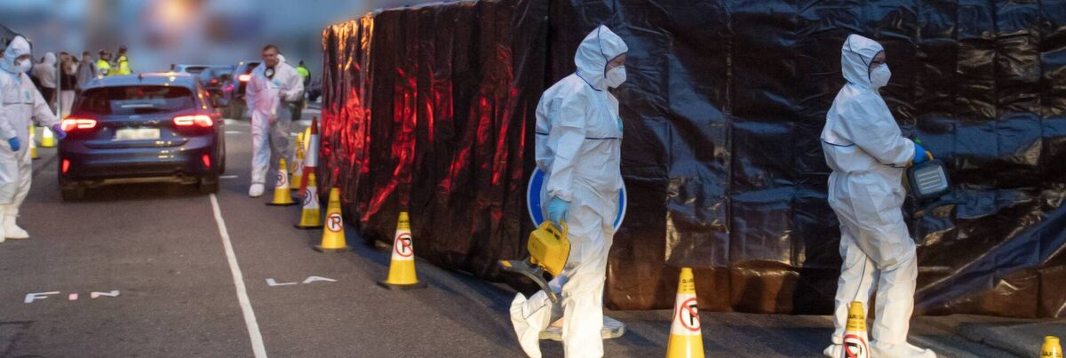 A Garda forensic team enter the home of the late Tina Satchwell on Grattan Street, Youghal after a man was arrested on suspicion of her murder. Picture Dan Linehan