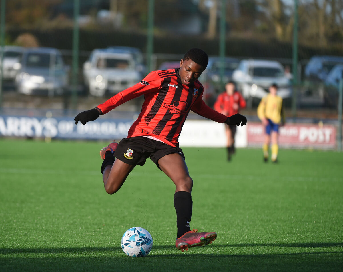  Jayden Umeh, Ringmahon Rangers in action up the right wing against Douglas Hall. 