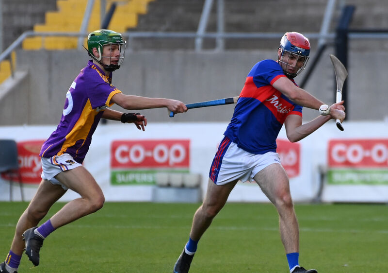 Erin's Own's Alan Moynihan clears from St Catherine's Kevin Barry. Picture: Eddie O'Hare Erin's Own's Alan Moynihan clears from St Catherine's Kevin Barry. Picture: Eddie O'Hare