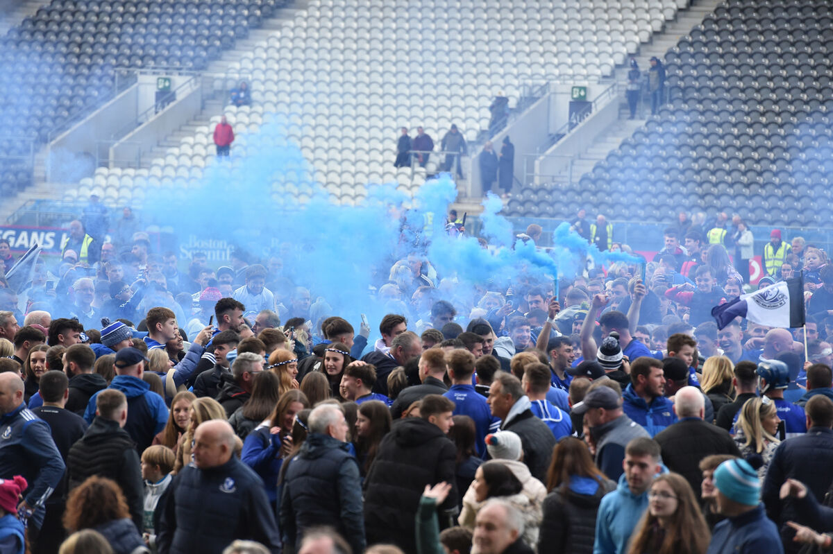  The Sarsfields team and supporters celebrate their victory over Midleton. Picture: Dan Linehan