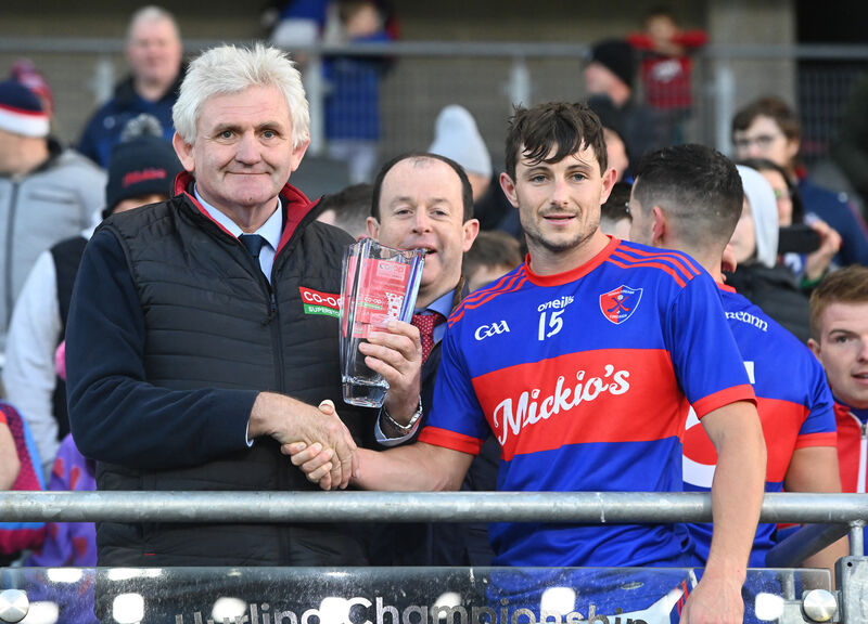 Dermot Foley of Co-op SuperStores presents the Player of the Match Award to Erin's Own's John Kavanagh. Picture: Eddie O'Hare Dermot Foley of Co-op SuperStores presents the Player of the Match Award to Erin's Own's John Kavanagh. Picture: Eddie O'Hare
