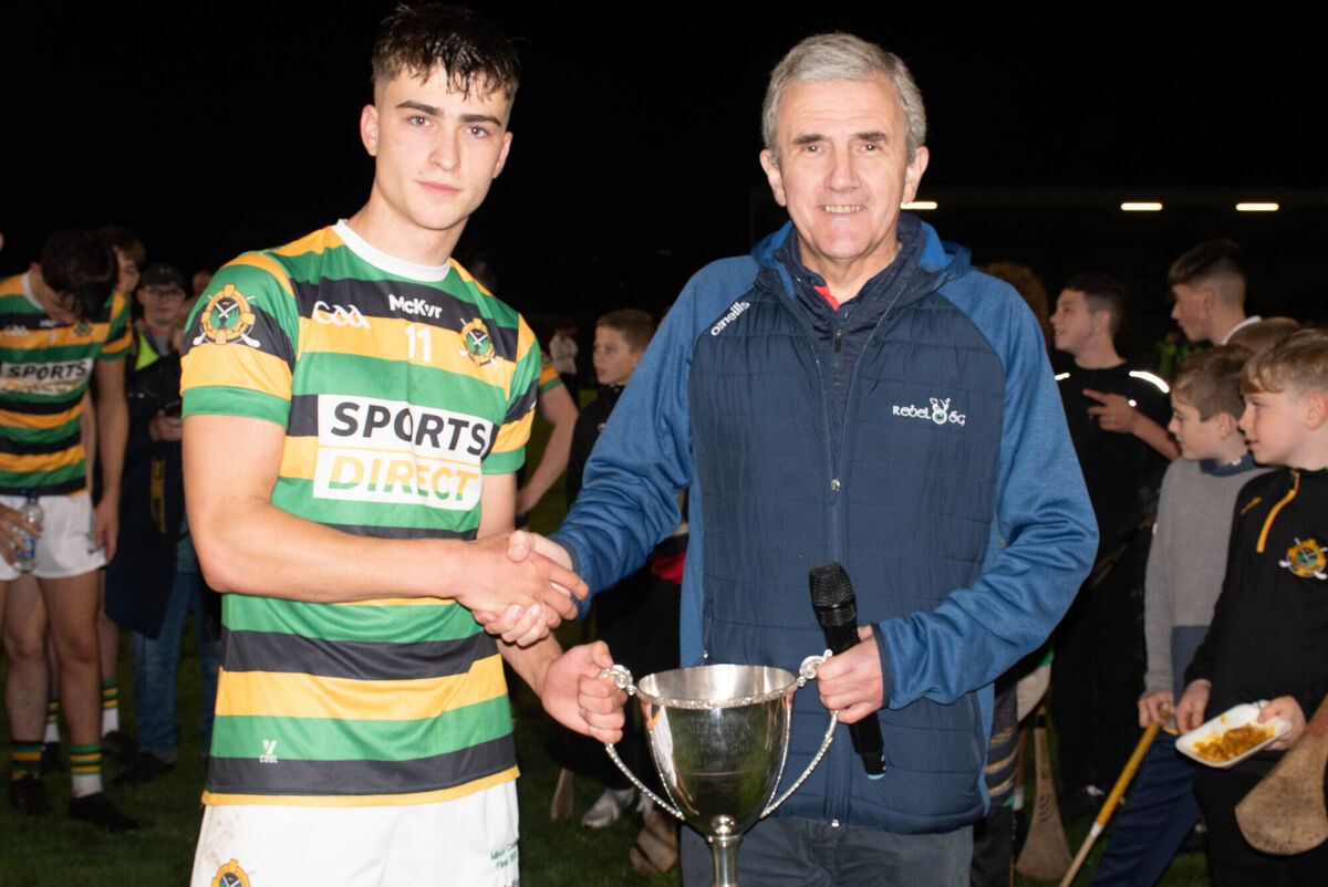 Michael O'Mahony presents Glen Rovers' Diarmuid Wall with the cup. Picture: Howard Crowdy Michael O'Mahony presents Glen Rovers' Diarmuid Wall with the cup. Picture: Howard Crowdy
