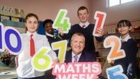 Finance Minister visits Carrigaline school to chat about maths and Budget 2024 with students
