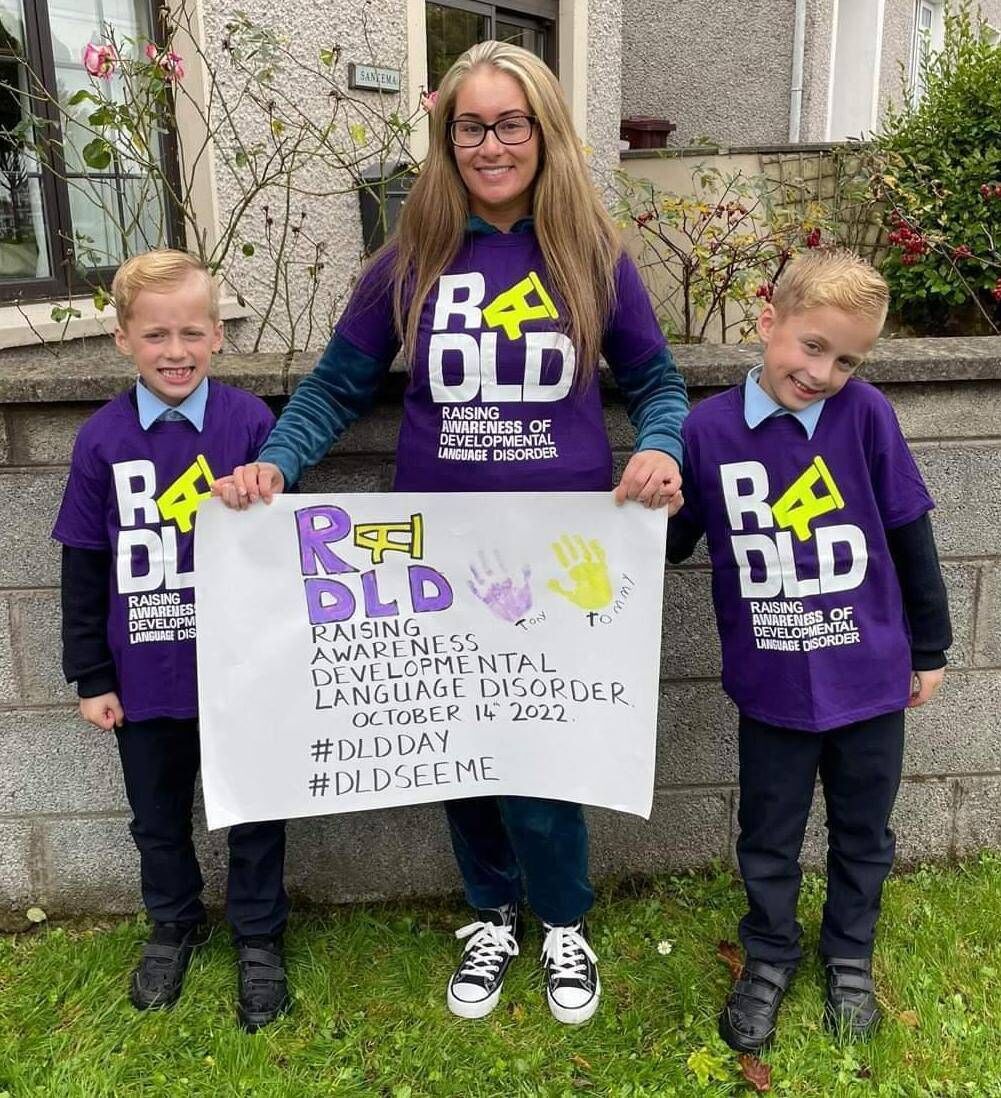 Neidín Dalton with her twin boys Tommy and Tony wearing purple and yellow for Developmental Language Disorder (DLD) awareness day last year. Neidín Dalton with her twin boys Tommy and Tony wearing purple and yellow for Developmental Language Disorder (DLD) awareness day last year.
