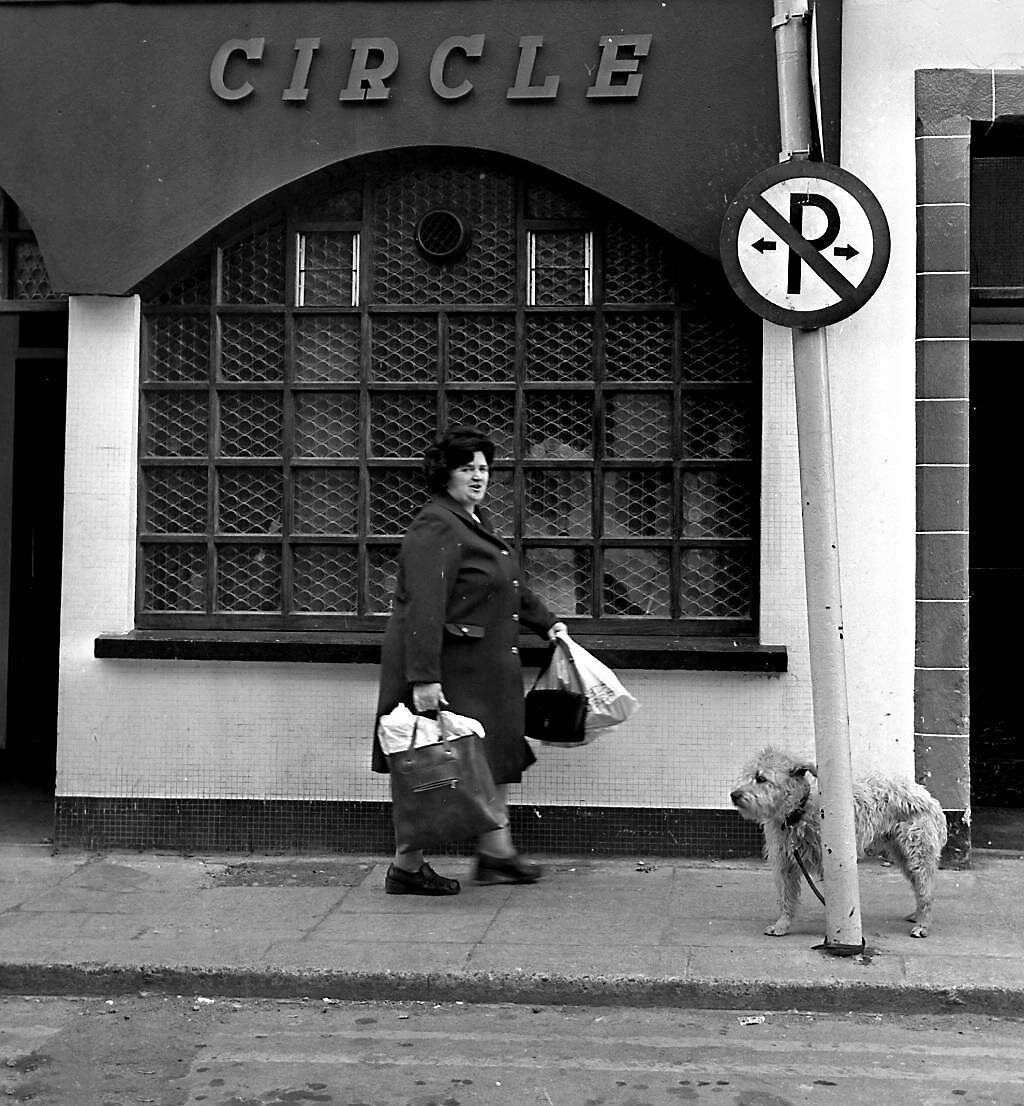 A dog waiting for his master outside the Grand Circle Bar on Drawbridge Street, Cork , in May, 1977. A Throwback Thursday reader points out the street name recalls a bridge that used to be here A dog waiting for his master outside the Grand Circle Bar on Drawbridge Street, Cork , in May, 1977. A Throwback Thursday reader points out the street name recalls a bridge that used to be here