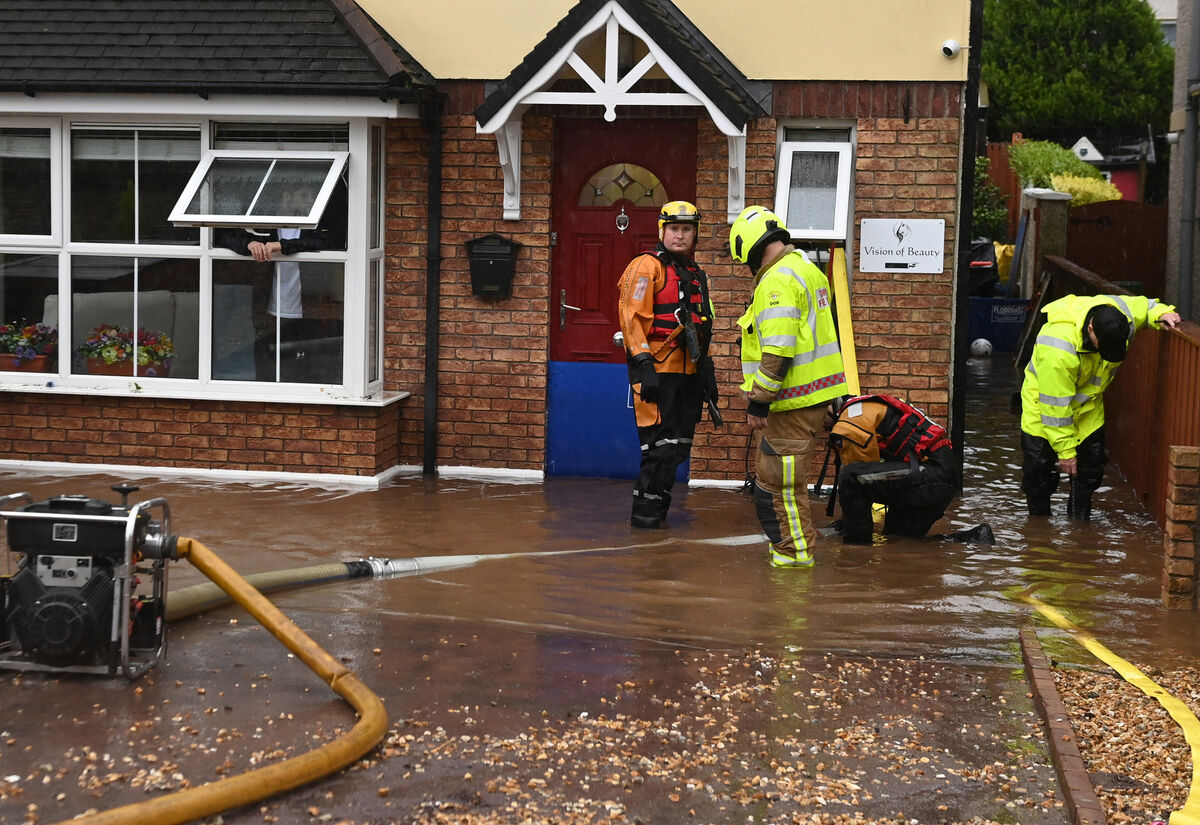 Fire brigade pumping out a house in Copper Valley View in Glanmire. Picture: Eddie O'Hare