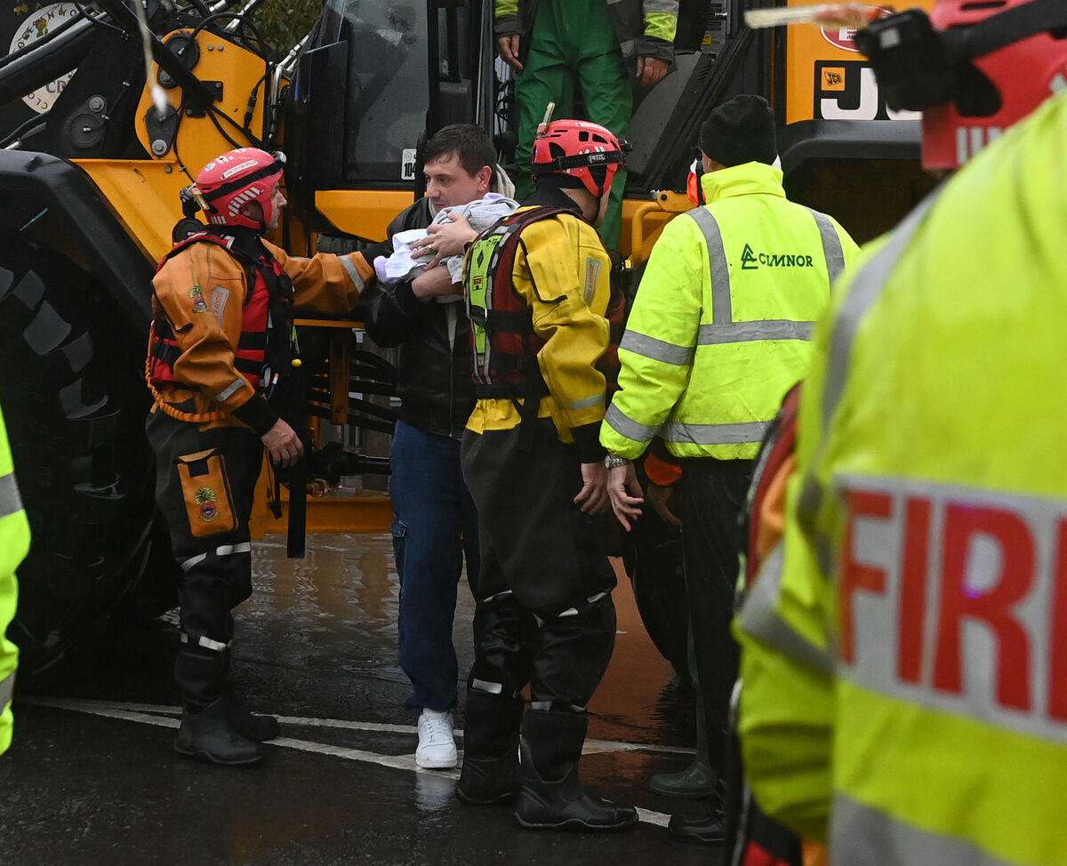 Locals rescued in from the flooding in Midleton . Picture: Eddie O'Hare