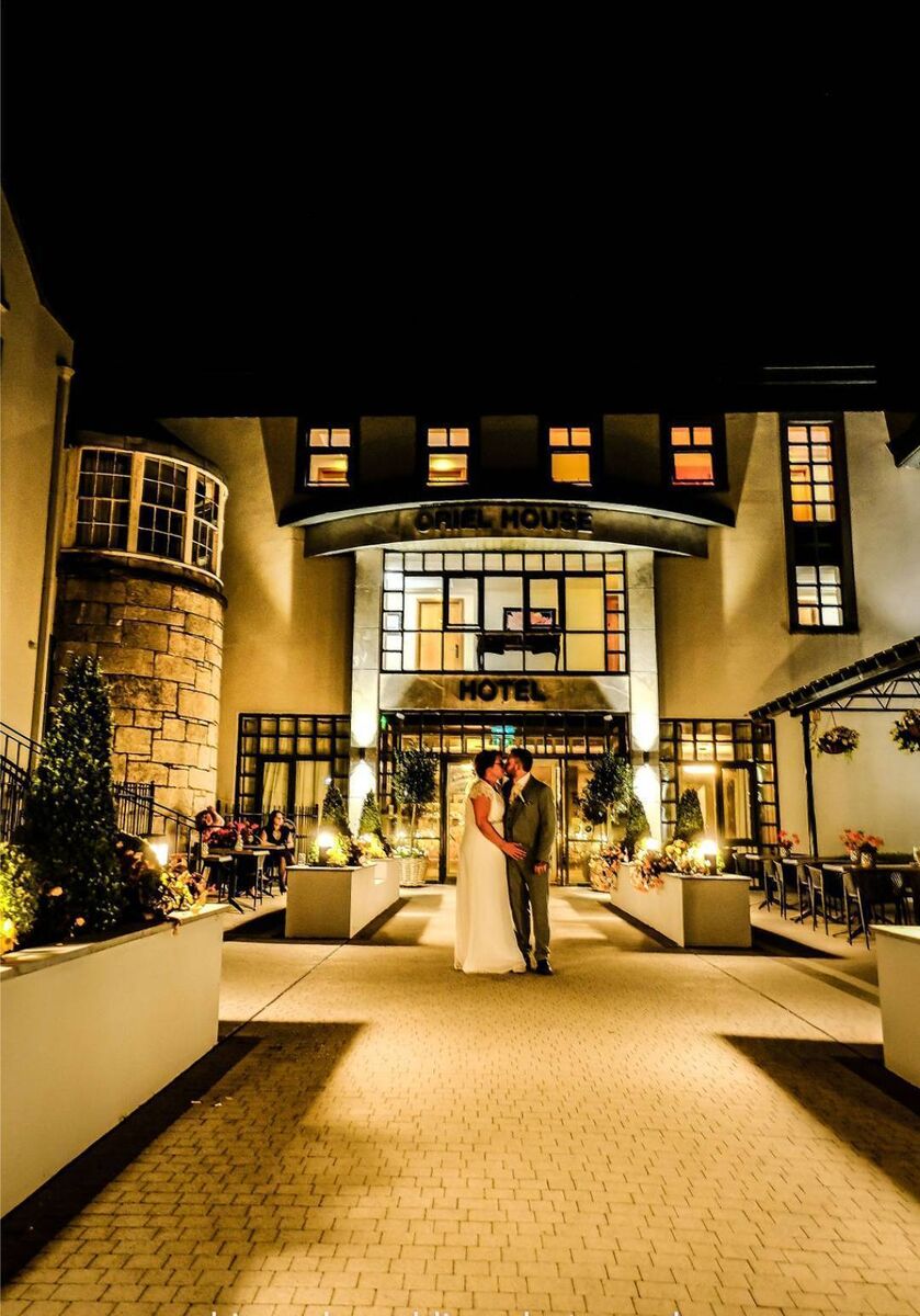 The couple outside their wedding venue, at the Oriel House Hotel. The couple outside their wedding venue, at the Oriel House Hotel.
