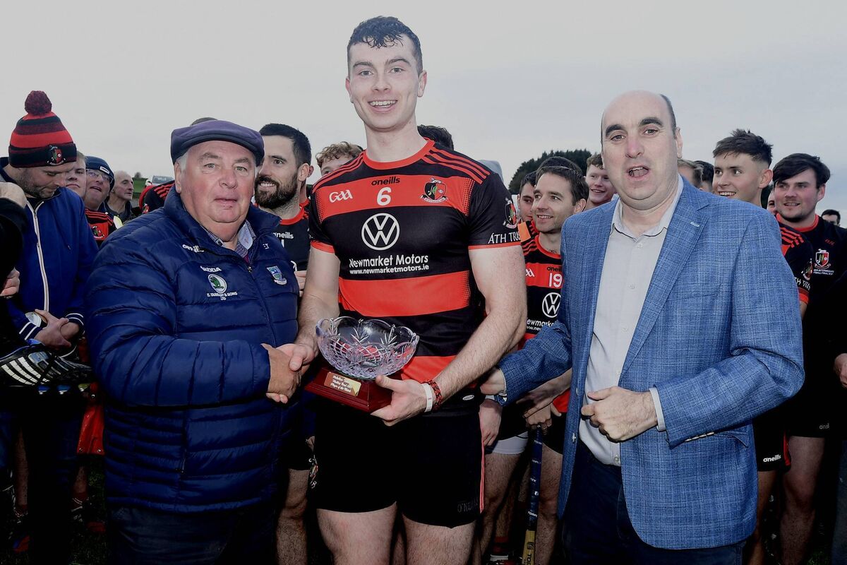 Josh O'Keeffe, Newmarket accepts the Duhallow JAHC man of the match award from Eamon Tarrant in the presence of Steven Lynch, chairman Duhallow GAA Board. Picture: John Tarrant Josh O'Keeffe, Newmarket accepts the Duhallow JAHC man of the match award from Eamon Tarrant in the presence of Steven Lynch, chairman Duhallow GAA Board. Picture: John Tarrant