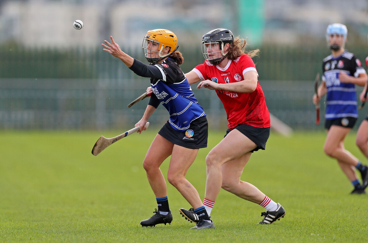  Roisin De Faoite, Seandún, challenges Ellen Murphy, Sarsfields. Picture: Jim Coughlan.