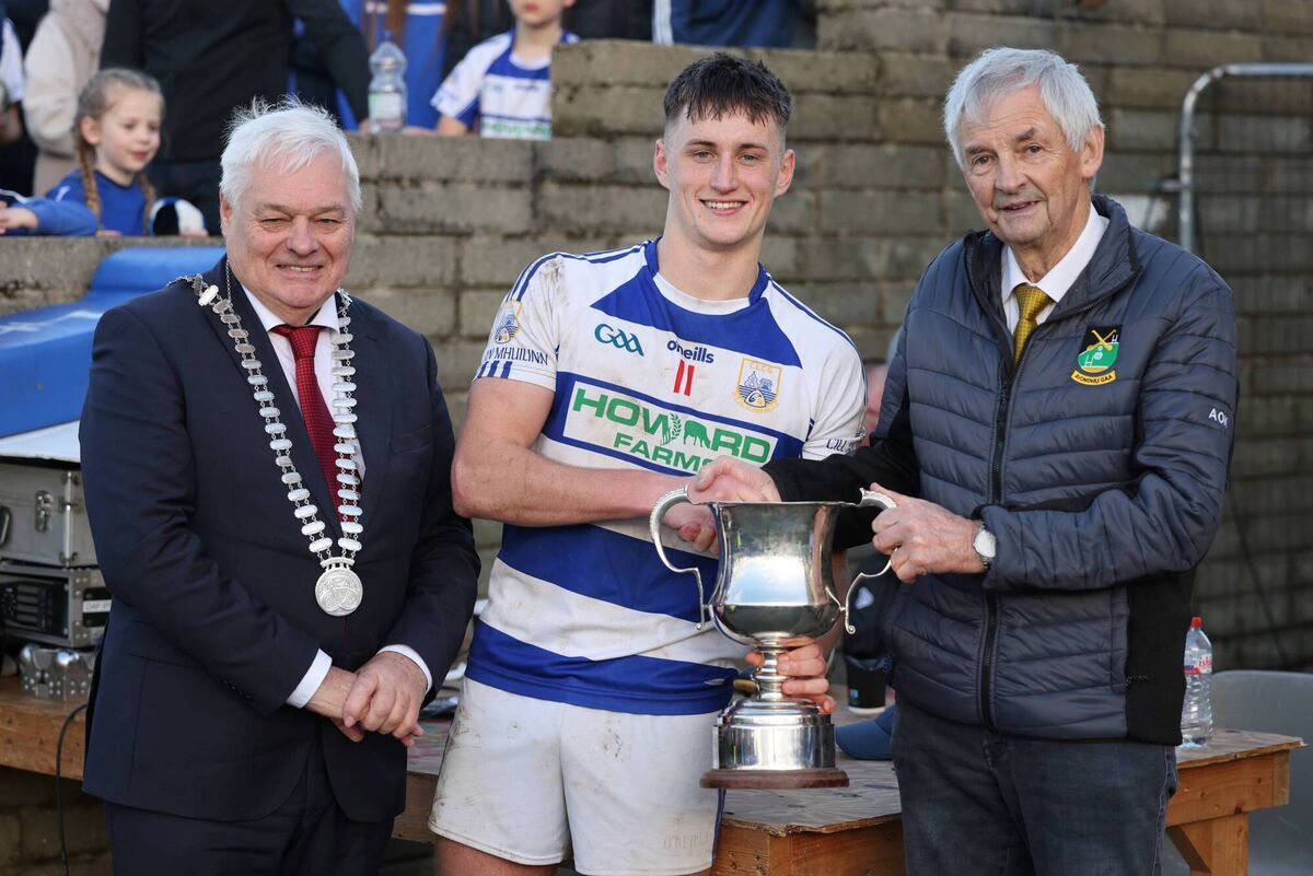 Eoin Birchall, Killavullen captain is presented with the cup after their win over Charleville. Picture: John Hannon