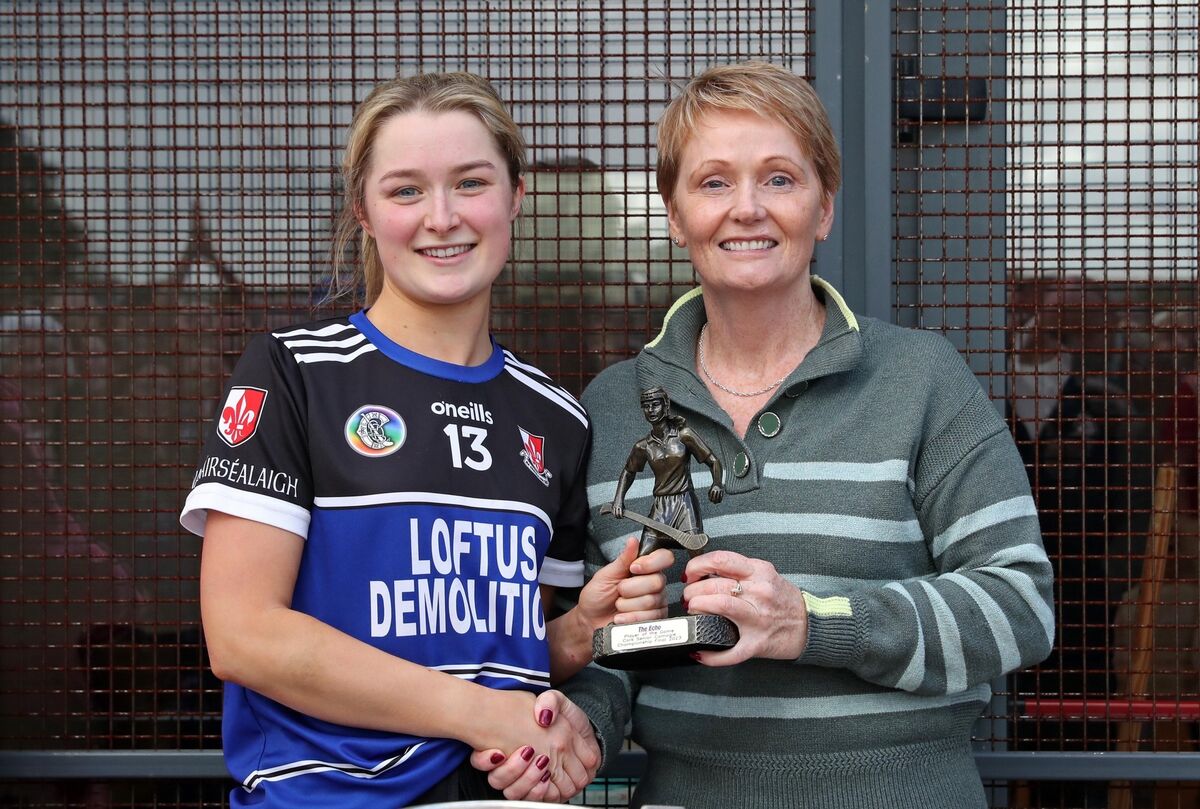 Clare Mullins, Sarsfields, receives the Player of the Match from Linda Mellerick. Picture: Jim Coughlan. Clare Mullins, Sarsfields, receives the Player of the Match from Linda Mellerick. Picture: Jim Coughlan.