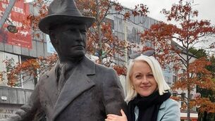 <p class="contextmenu internal_Caption">Kathriona Devereux beside the new Michael Collins statue on Grand Parade in Cork city. Picture: Rory Devereux-O’Connor</p>