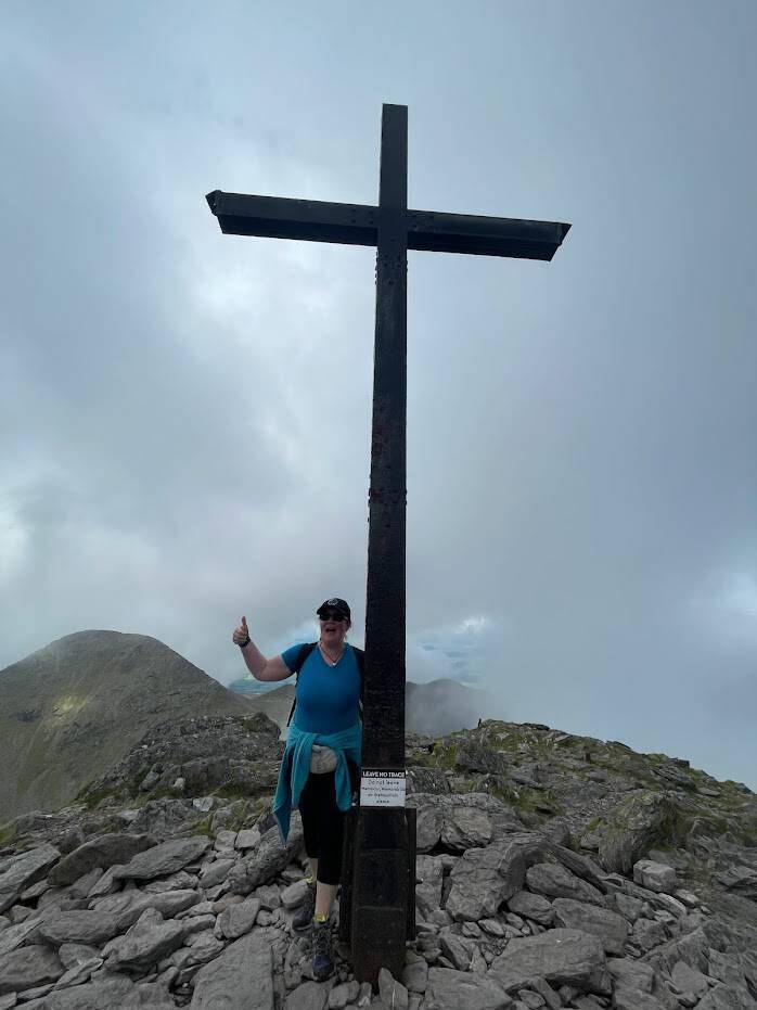 Mary, having reached the summit. Mary, having reached the summit.