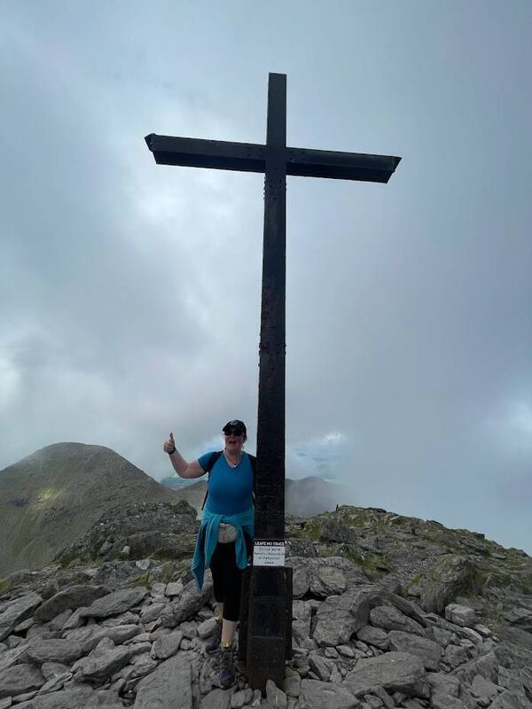 Mary, having reached the summit.
