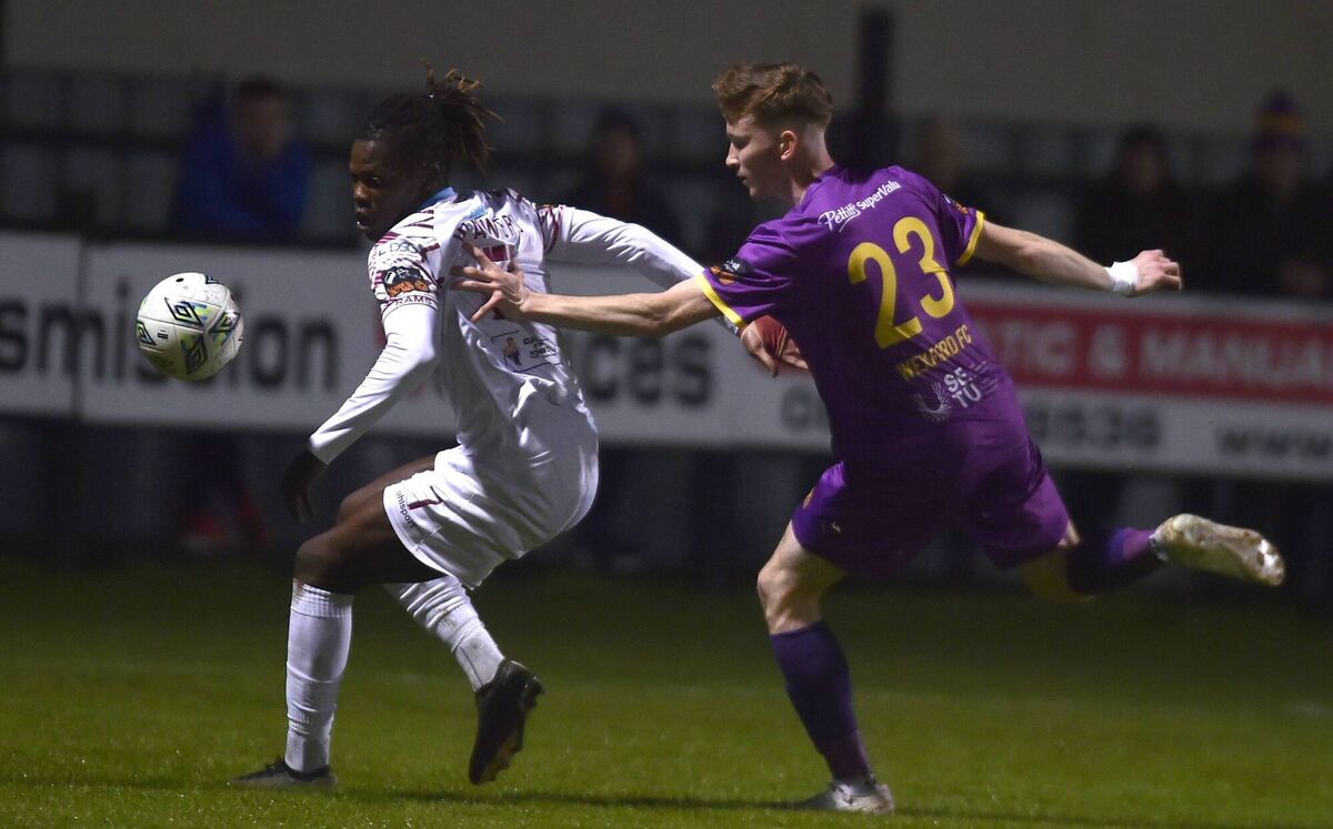 Wexford FC's Cian O'Malley and Cobh's Wilson Waweru battle for the ball in Ferrycarrig Park on Tuesday evening. Pic: jim campbell