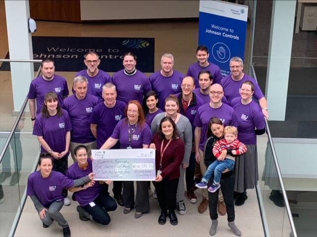 Johnson Controls staff who climbed up Carrauntoohil presented $15,429 to Cystic Fibrosis Ireland.