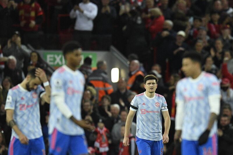 Manchester United's English defender Harry Maguire (second from right) reacts after Liverpool's Egyptian midfielder Mohamed Salah scored his team second goal in the 4-0  Premier League defeat at Anfield in Liverpool on April 19, 2022. Picture: OLI SCARFF/AFP via Getty Images