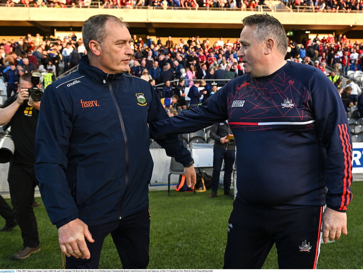 Pat Ryan with Tipperary manager Liam Cahill after the counties' draw at Páirc Uí Chaoimh in May. Picture: David Fitzgerald/Sportsfile