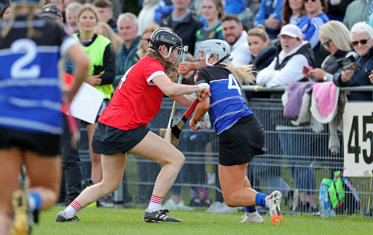 Roisin De Faoite, Seandún, battles Olivia McAllen, Sarsfields. Picture: Jim Coughlan. Roisin De Faoite, Seandún, battles Olivia McAllen, Sarsfields. Picture: Jim Coughlan.