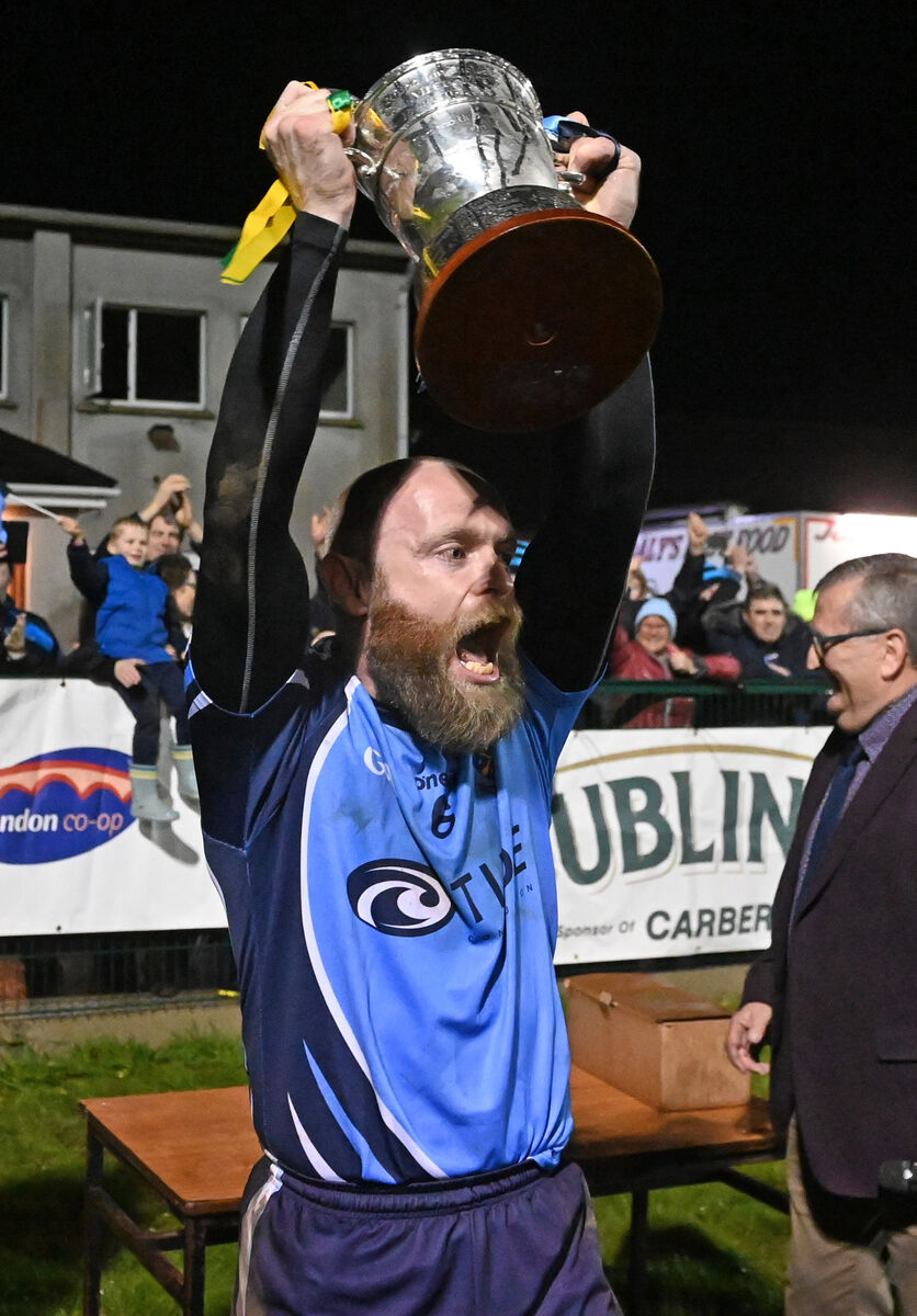 Barryroe captain Martin Collins raises the trophy after defeating Kilmacabea in the Bandon Co-Op West Cork JAFC final at Dunmanway. Picture; Eddie O'Hare