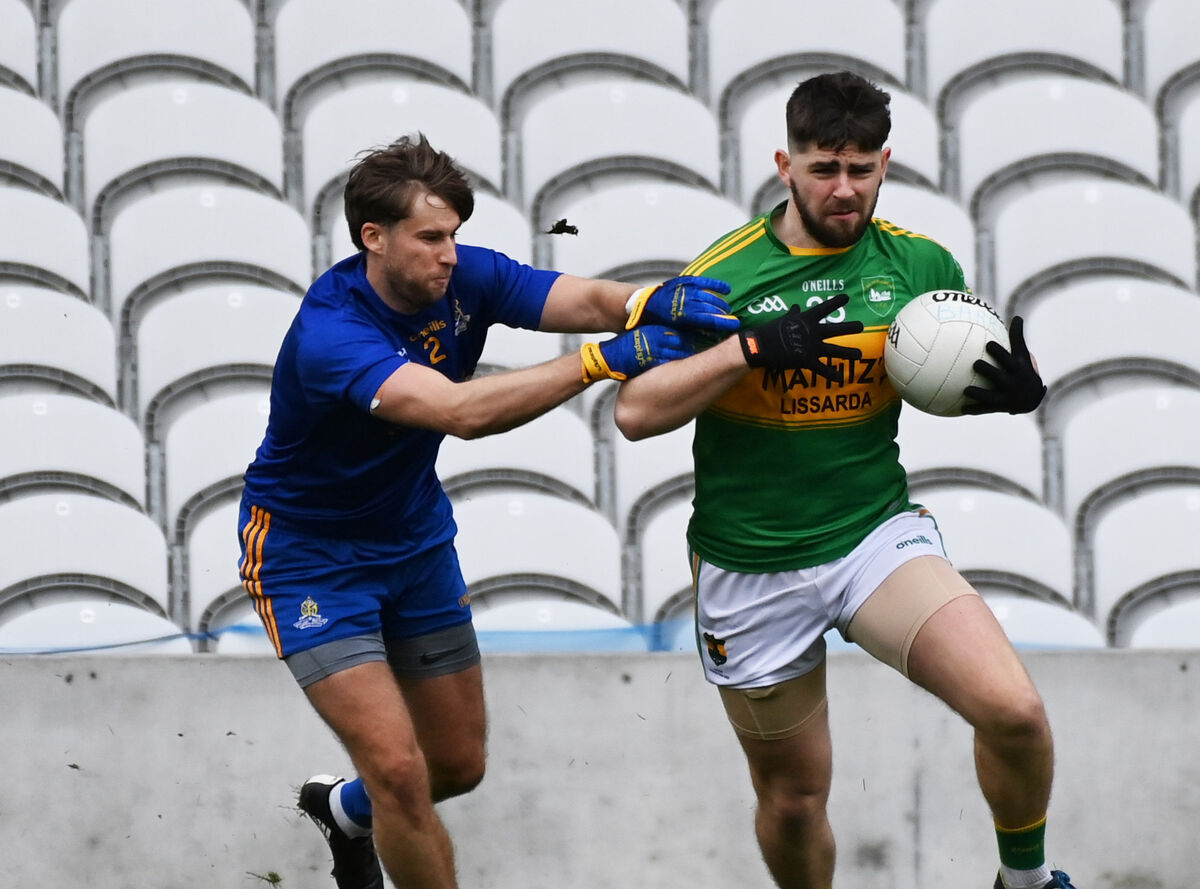 Kilmurry's Joe Ryan is tackled by St Finbarr's Mark Russell during the Premier JFC final at Páirc Uí Chaoimh. Picture: Eddie O'Hare