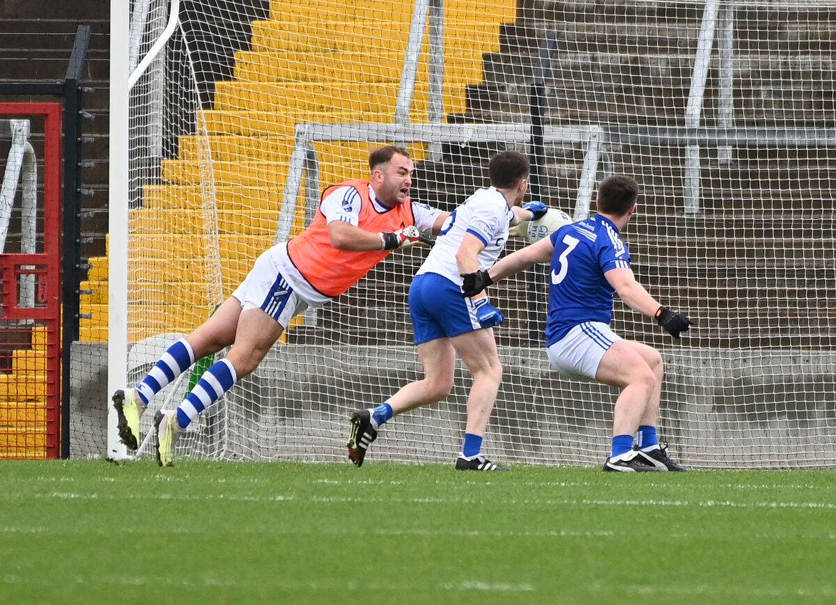 Cill Na Martra's Maidhcí Ó Duinnín scores his side's second past Bantry Blues' goalkeeper Mike Casey and Tim Cronin. Picture: Eddie O'Hare Cill Na Martra's Maidhcí Ó Duinnín scores his side's second past Bantry Blues' goalkeeper Mike Casey and Tim Cronin. Picture: Eddie O'Hare