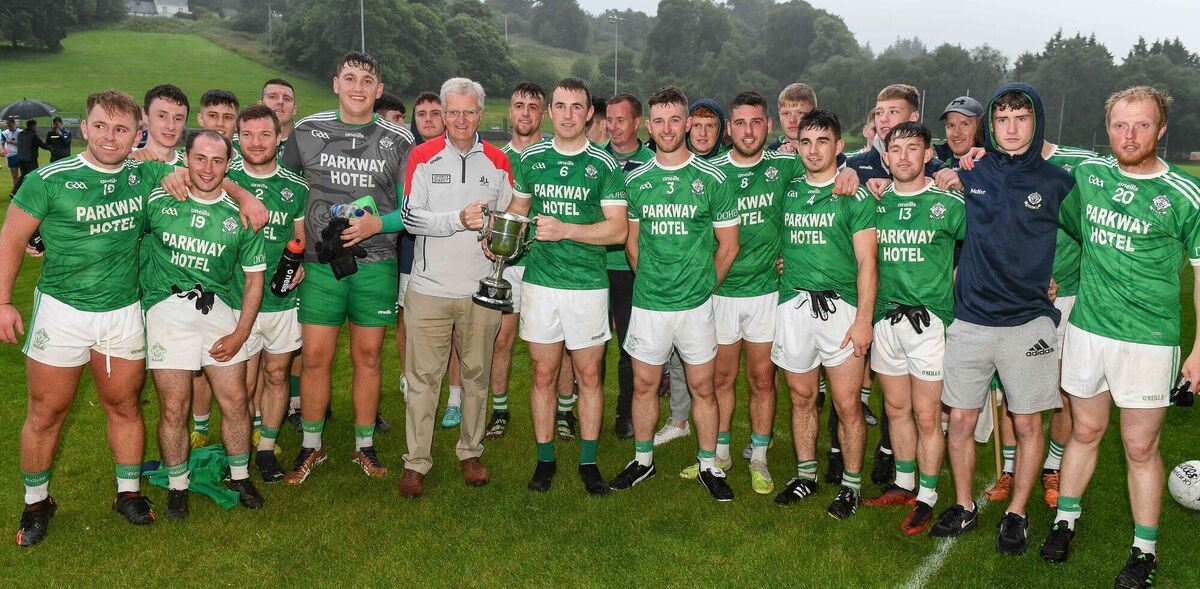 Cork County Board officer Donal McSweeney presents the cup to Dohenys captain Eoin Lavers, after winning the Cork Credit Unions Division 3 football league final in Macroom back in August. Picture: David Keane  Cork County Board officer Donal McSweeney presents the cup to Dohenys captain Eoin Lavers, after winning the Cork Credit Unions Division 3 football league final in Macroom back in August. Picture: David Keane