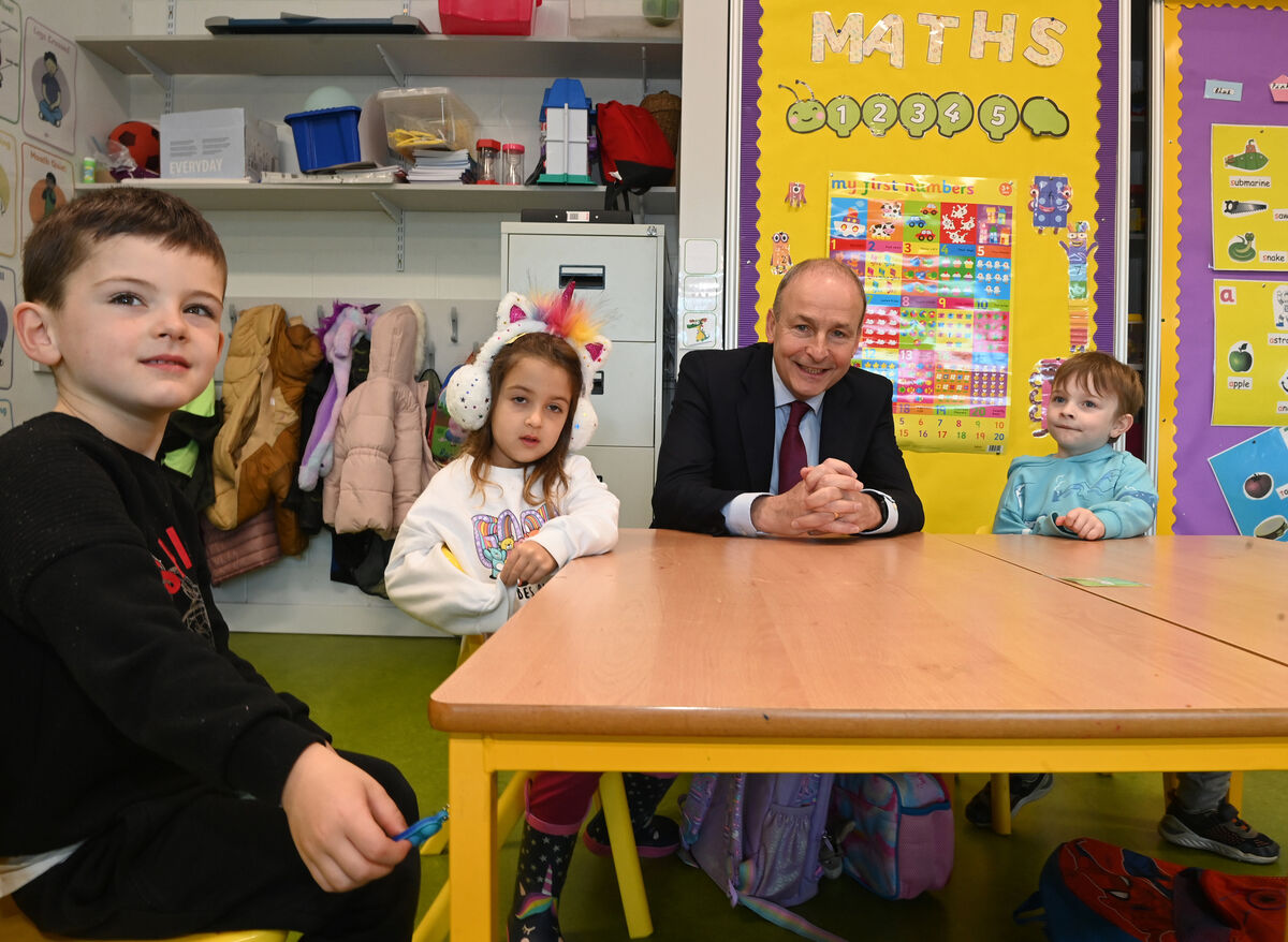 Tánaiste Micheál Martin meets junior infant pupils at the school. Picture: Larry Cummins