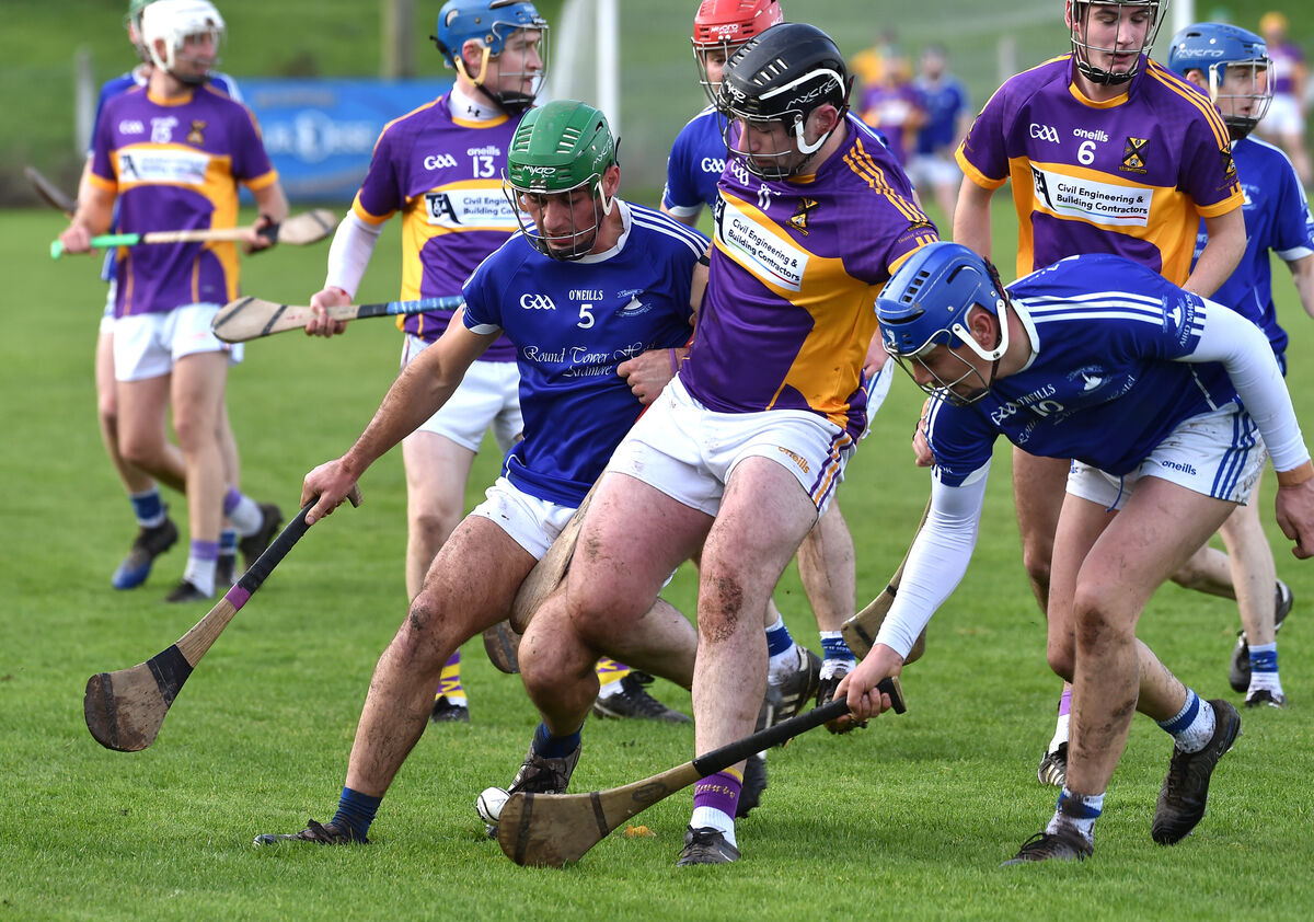  Rory Galvin of St Catherine's getting between Ardmore players Jack Keane and John O'Brien. Picture: Dan Linehan