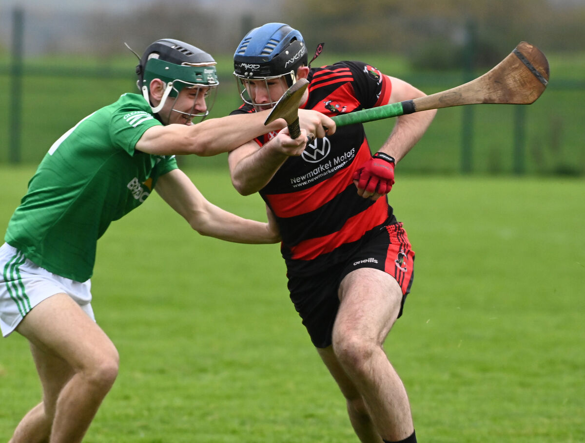 Newmarket's Cathal Browne is tackled by Harbour Rovers' Tom McGrath. Picture: Eddie O'Hare Newmarket's Cathal Browne is tackled by Harbour Rovers' Tom McGrath. Picture: Eddie O'Hare