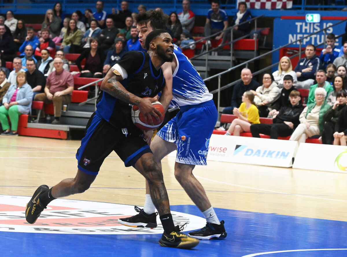 UCC Demon's Seventh Woods goes past Maree's Eoin Rockall during the Pat Duffy Men's National cup at The Neptune stadium. Picture; Eddie O'Hare