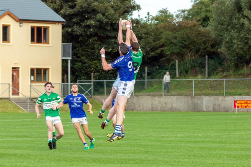 Fintan Goold of Macroom wins the ball in the air despite the attentions of Bantry Blues' Stephen Coughlan in the Bon Secours Hospital Premier IFC game at Ballingeary. Picture: John Delea Fintan Goold of Macroom wins the ball in the air despite the attentions of Bantry Blues' Stephen Coughlan in the Bon Secours Hospital Premier IFC game at Ballingeary. Picture: John Delea