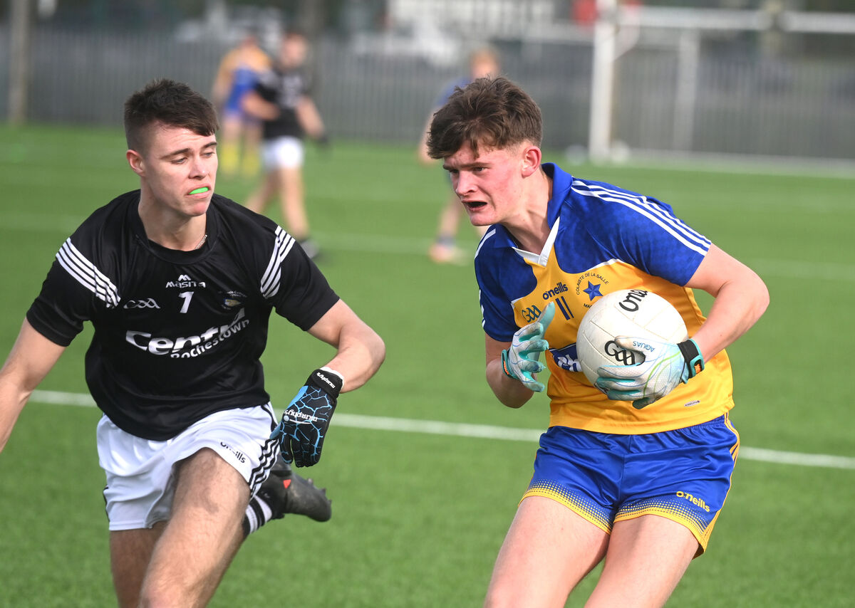 Ben Crowley, St Francis College Rochestown, chases Tom Browne, De La Salle College Macroom in the Corn Uí Mhuirí clash at Bishopstown. Picture: Larry Cummins