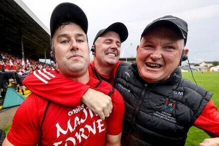 Ger Manley (right front), Wesley O’Brien (left) and Liam Cronin (back row) after winning the semi-final in Nowlan Park this season.
