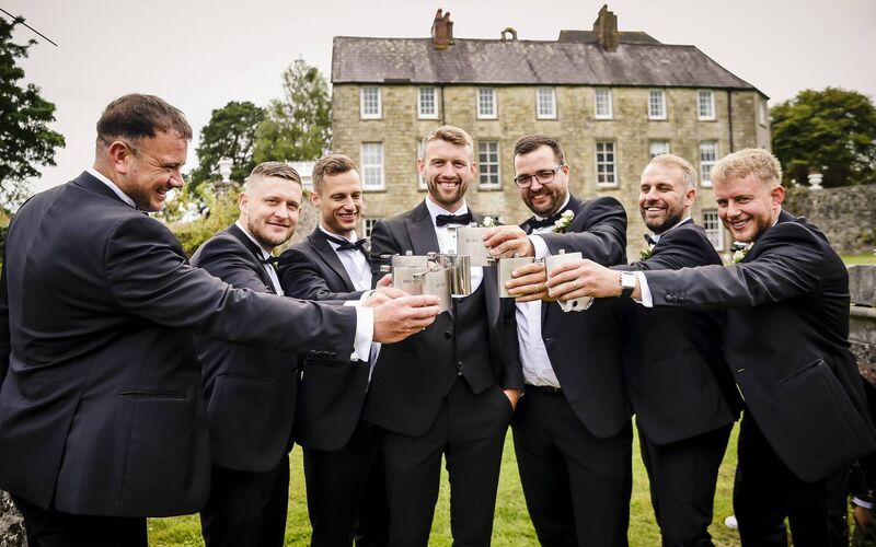 James Prunty, from Wigan, with family and friends raising a glass to his wedding day.