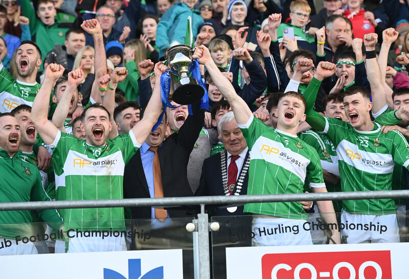 Aghabullogue captain Paul Ring (right) and vice captain John Corkery raise the trophy after defeating Mitchelstown in the Bon Secours Hospital IAFC final at Páirc Uí Chaoimh. Picture: Eddie O'Hare